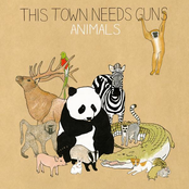 Dog by This Town Needs Guns