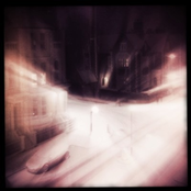 One night, two men walking. The memory of a winter city silence