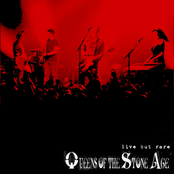 Punk Rock Caveman Living In A Prehistoric Age by Queens Of The Stone Age