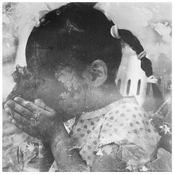 Abandoned in the Garden of a Tyrant, a Farewell Forever to the Arc, With Trembling Hands We Weave Across Rusted Strings Like Their Smoke in Waves of Worn and Worried Wander...