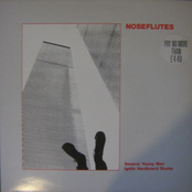 Several Young Men Ignite Hardboard Stump