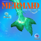 There Is A Mermaid Using The Computer