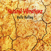 Balls Rolling by Natural Vibrations