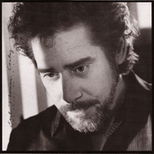 We Believe In Happy Endings by Earl Thomas Conley