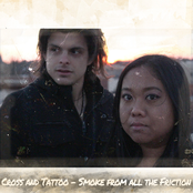 Smoke From All The Friction: Cross & Tattoo