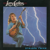 Midnight Parade by Larry Carlton