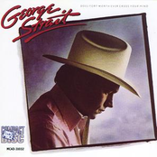 Love Comes From The Other Side Of Town by George Strait