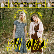 Satan and I walk under a rainbow