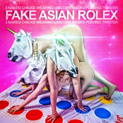 Three naked chicks wearing unicorn masks playing twister