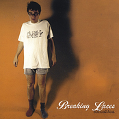 She Waits by Breaking Laces