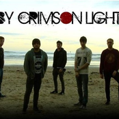 By Crimson Light