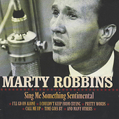 At The End Of A Long Lonely Day by Marty Robbins