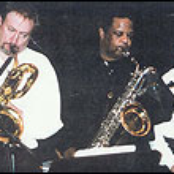 three baritone saxophone band