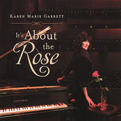 It's About The Rose In The Vase On The Table by Karen Marie Garrett