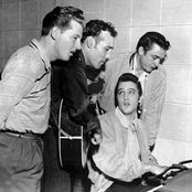 elvis presley, jerry lee lewis, carl perkins