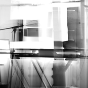 Six sonic movements through amplified metal pieces, paper noises, strings, sine waves, plastic animals, objects, voice, a quietly beeping heating system and street noises