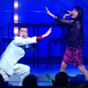 スナックのママと流し 的头像