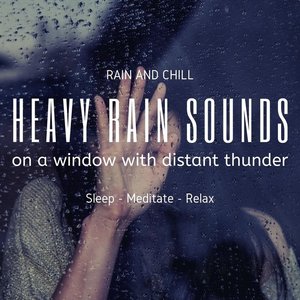 Heavy Rain Sounds on a Window with Distant Thunder