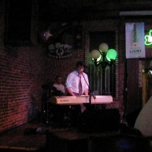 Chris Kerrigan & The Infernal Racket 的头像