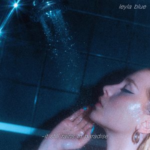 Leyla Blue - It Still Rains in Paradise Lyrics - Zortam Music