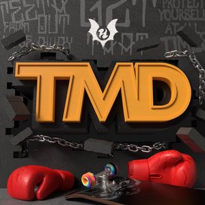 T M D