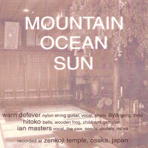mountain ocean sun