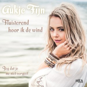 Fluisterend hoor ik de wind