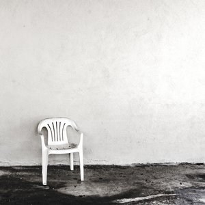 Plastic Chairs & Cigarette Fumes