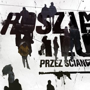 przez ścianę