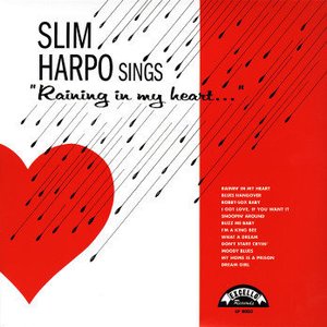 Sings "Raining in my heart..."