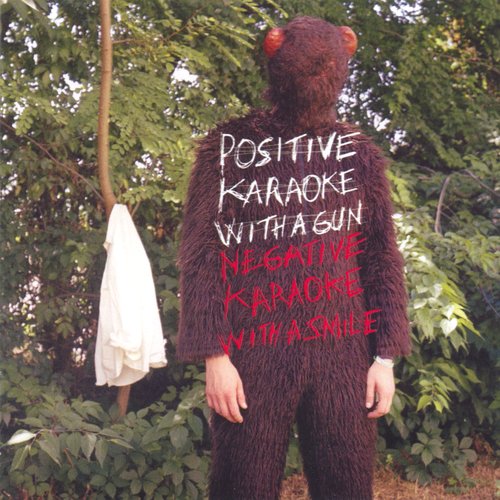 Positive karaoke with a gun - negative karaoke with a smile