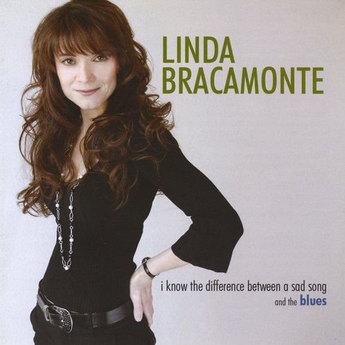I Know the Difference Between a Sad Song and the Blues