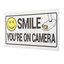 smile (yr on camera) :)
