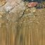 water splashed stone