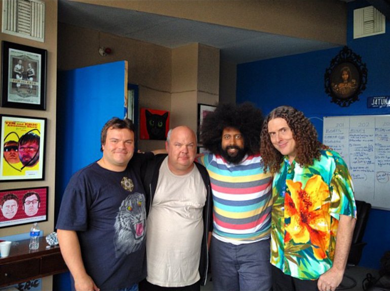 Tenacious D chilling with Reggie Watts and Weird Al with lots of Tim & Eric Decor 