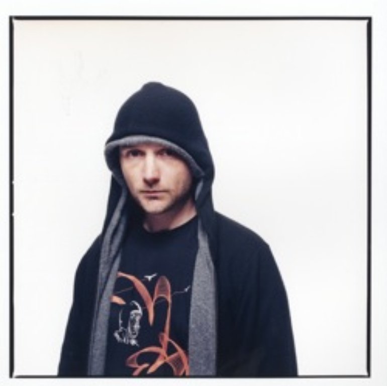 Moby with hoodie.