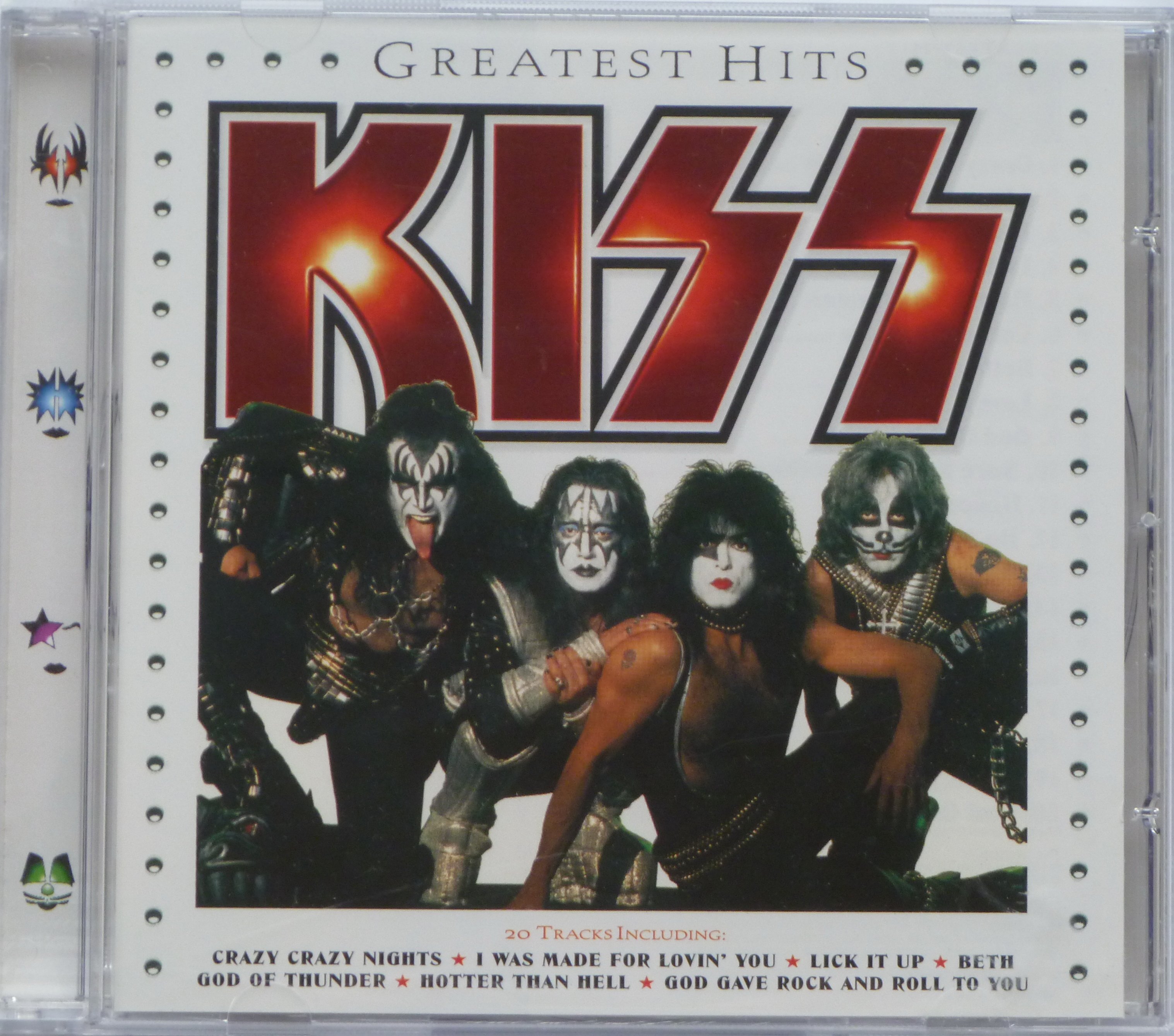 We kiss перевод. Kiss Greatest Hits 1997. Kiss Greatest Hits 1996. Kiss Greatest Kiss обложка. Greatest Hits Кисс.