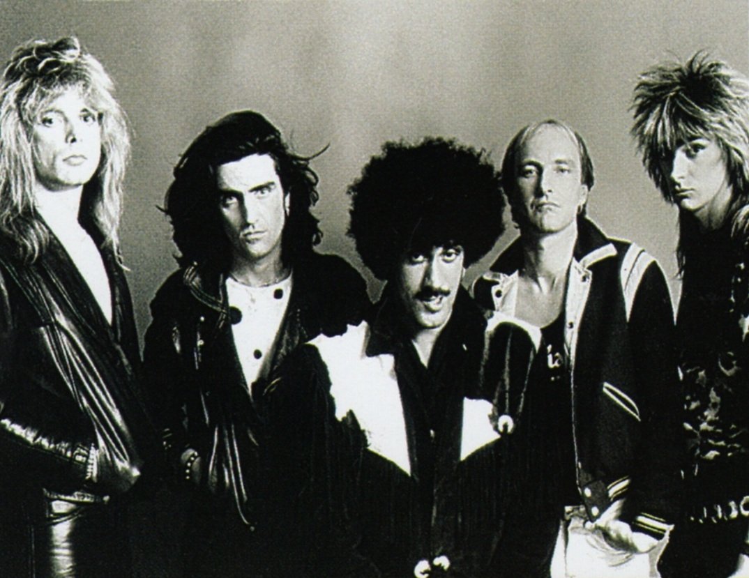 Phil Lynott's Grand Slam music, videos, stats, and photos