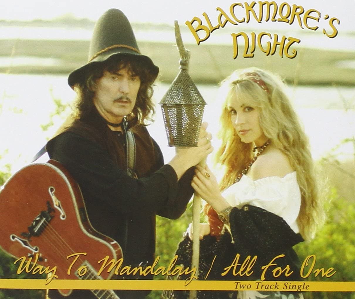 Blackmores night shadow of the moon. Группа Blackmore’s Night. Blackmore's Night обложки альбомов. Blackmore's Night Fires at Midnight 2001. Блэкморс Найт альбомы.