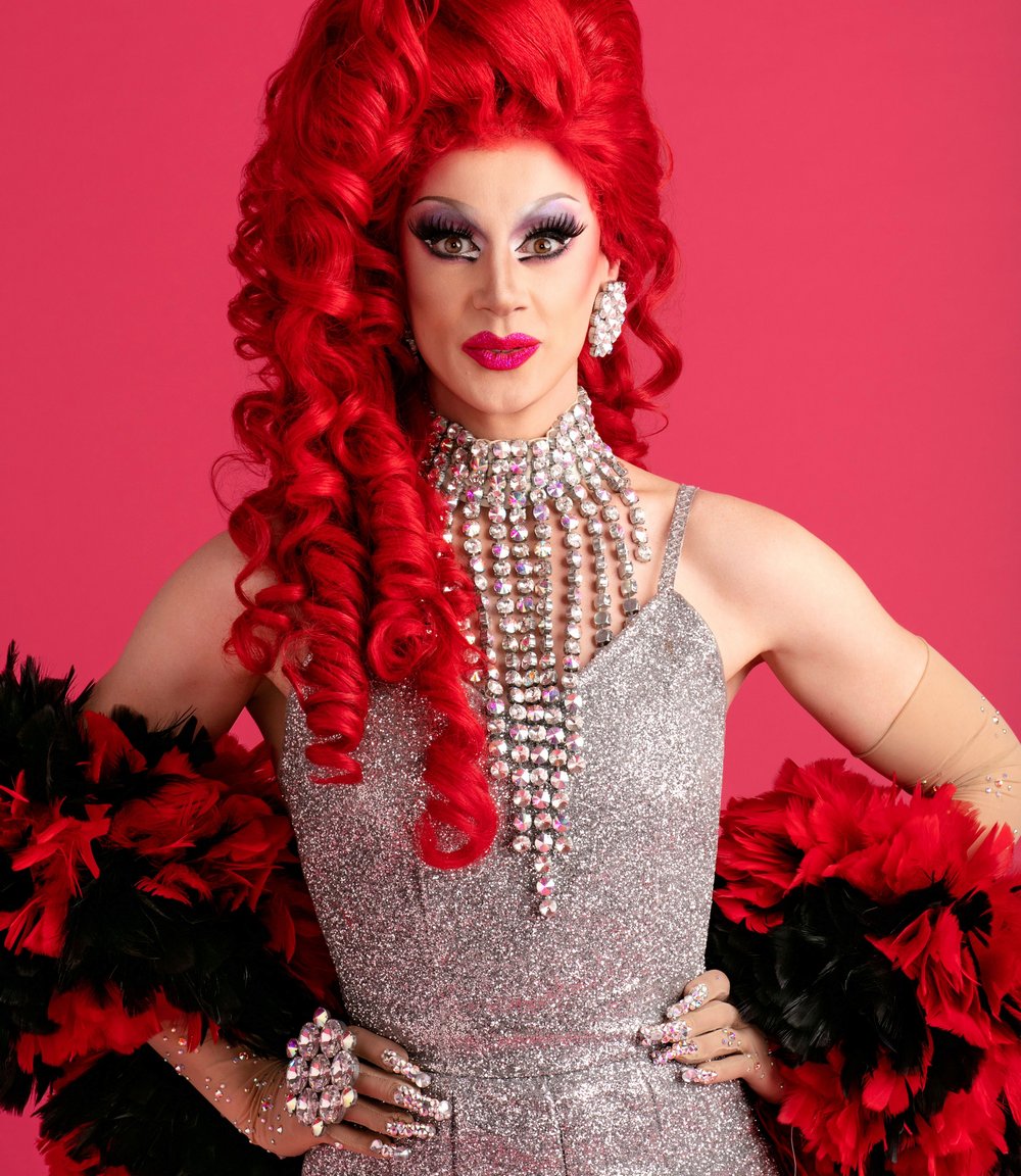 divina de campo red wig silver dress A Red Wig And a Silver Dress?