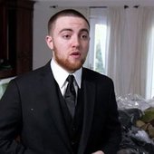 mac miller pure in a suit