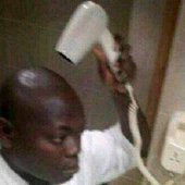 Snowee drying his hair