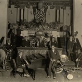 Violinist Leroy Smith and his orchestra posing with musical instruments (2)-crop.jpg