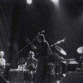 A photo of the band in a live performance from prog archives