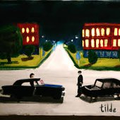 Tilde(~)