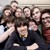 The cast of CollegeHumor: Amir, Dan, Jake, Jeff, Patrick, Ricky, Sam, Sarah, and Streeter