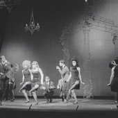 Chorus performing "Rich Man's Frug" in the stage production Sweet Charity