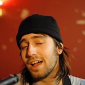 Singing. Red Wall.