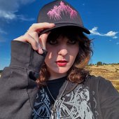 astrid wearing a cap