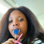Peaches eating Lolipop